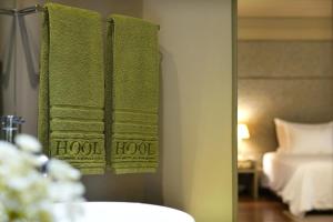 Cama ou camas em um quarto em Hotel da Oliveira
