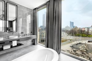 Vannituba majutusasutuses HYPERION Hotel Leipzig