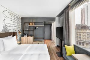 Voodi või voodid majutusasutuse HYPERION Hotel Leipzig toas