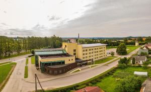 an aerial view of a building in a city at Hotel Tigra in Priekuļi