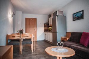 Kuchyň nebo kuchyňský kout v ubytování Hotel Garni Romantika