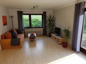 Posezení v ubytování Ferienwohnung Haus Wiesengrund