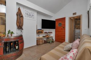 TV a/nebo společenská místnost v ubytování Villa Levanda