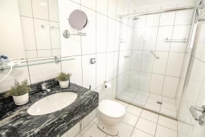 Koupelna v ubytování Charrua Hotel