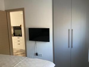 TV a/nebo společenská místnost v ubytování TAL