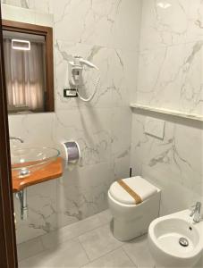 Vannituba majutusasutuses Hotel Lo Scudiero