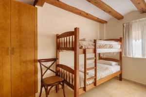 Postel nebo postele na pokoji v ubytování Apartamentos Casa Les Valeres