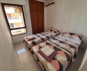 Postel nebo postele na pokoji v ubytování Apartment by the Playa L'Albir
