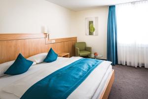 Voodi või voodid majutusasutuse Hotel Buchserhof toas