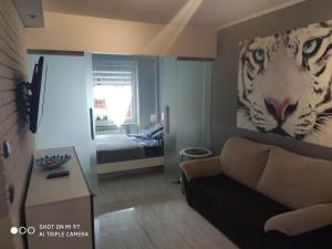 Posteľ alebo postele v izbe v ubytovaní Apartament Tygrys