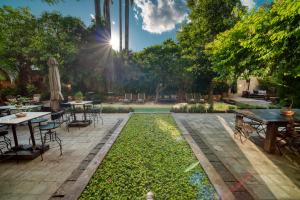 A garden outside Factoria Hotel