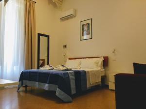 A bed or beds in a room at YooRoom