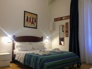 A bed or beds in a room at YooRoom