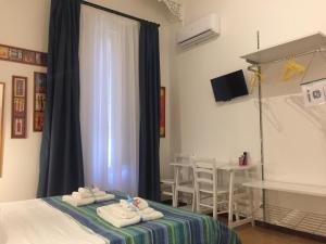 A bed or beds in a room at YooRoom