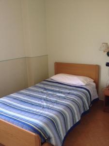 Postel nebo postele na pokoji v ubytování Ristorante Albergo da Giovanni
