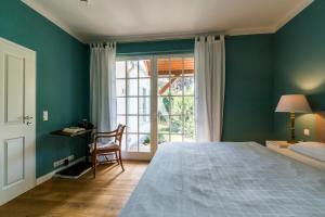 Postel nebo postele na pokoji v ubytování Atelierhaus "Müller-Schönefeld"
