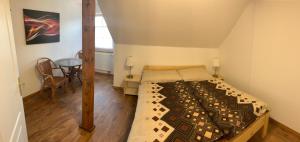 Posteľ alebo postele v izbe v ubytovaní Apartmány u Michala