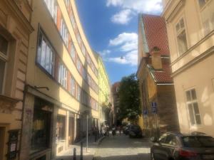 a city street filled with lots of tall buildings at Ragtime in Prague