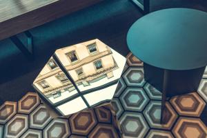 Uma área de estar em Hotel Bernina Geneva