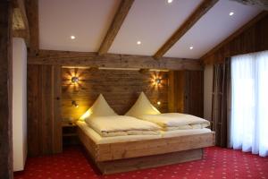 Cama ou camas em um quarto em Pension Wendelstein