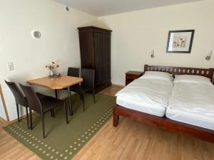 Postel nebo postele na pokoji v ubytování Villa Bergfried