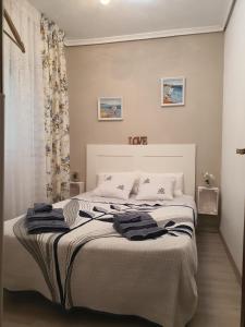 A bed or beds in a room at CASA DE SILVA