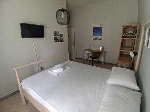 Postel nebo postele na pokoji v ubytování Terra di Sud Rooms + 13 fotografií