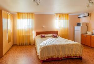 Cama o camas de una habitación en Fortuna Apartments