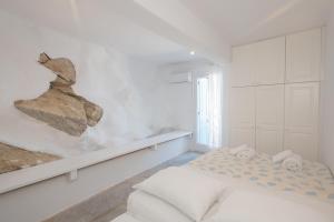 Letto o letti in una camera di Villa Boufla