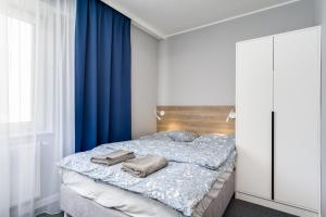 Postel nebo postele na pokoji v ubytování Hugo