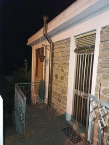 an outside view of a house at night at Borgo San Biagio in Basicò