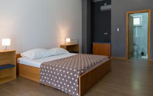 Postel nebo postele na pokoji v ubytování Guesthouse Palombaro