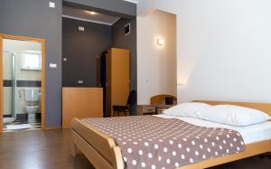 Postel nebo postele na pokoji v ubytování Guesthouse Palombaro