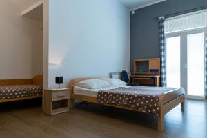 Postel nebo postele na pokoji v ubytování Guesthouse Palombaro