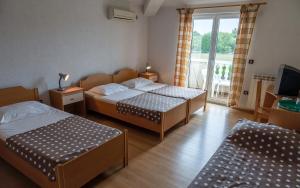 Postel nebo postele na pokoji v ubytování Guesthouse Palombaro