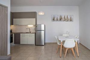 Η κουζίνα ή μικρή κουζίνα στο Cozy House in Tinos