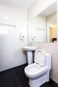 Koupelna v ubytování Emart Hotel (Riam)