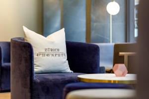 Ein Sitzbereich in der Unterkunft Hotel Felix