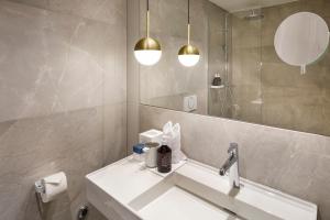 Ein Badezimmer in der Unterkunft Hotel Felix