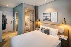 Ein Bett oder Betten in einem Zimmer der Unterkunft Hotel Felix