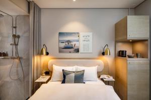 Ein Bett oder Betten in einem Zimmer der Unterkunft Hotel Felix