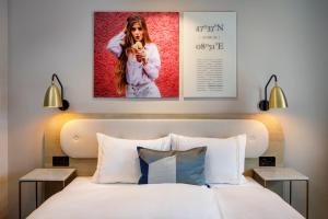 Ein Bett oder Betten in einem Zimmer der Unterkunft Hotel Felix