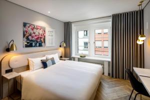Ein Bett oder Betten in einem Zimmer der Unterkunft Hotel Felix
