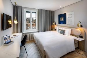 Ein Bett oder Betten in einem Zimmer der Unterkunft Hotel Felix