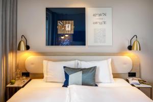 Ein Bett oder Betten in einem Zimmer der Unterkunft Hotel Felix