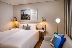 Ein Bett oder Betten in einem Zimmer der Unterkunft Hotel Felix