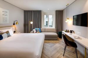Ein Bett oder Betten in einem Zimmer der Unterkunft Hotel Felix
