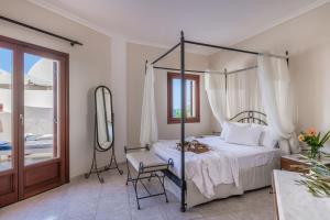 Epavlis Hotel & Spa客房内的一张或多张床位