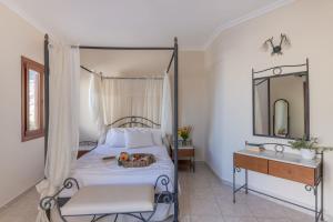 Epavlis Hotel & Spa客房内的一张或多张床位