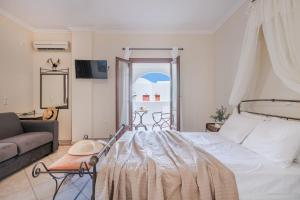 Epavlis Hotel & Spa客房内的一张或多张床位